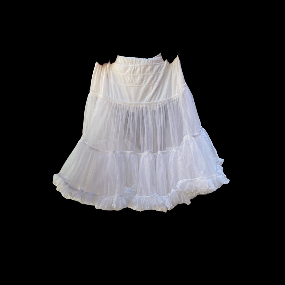 Crinoline slip.waist is  24 inches relaxed and   It is  24 inches long